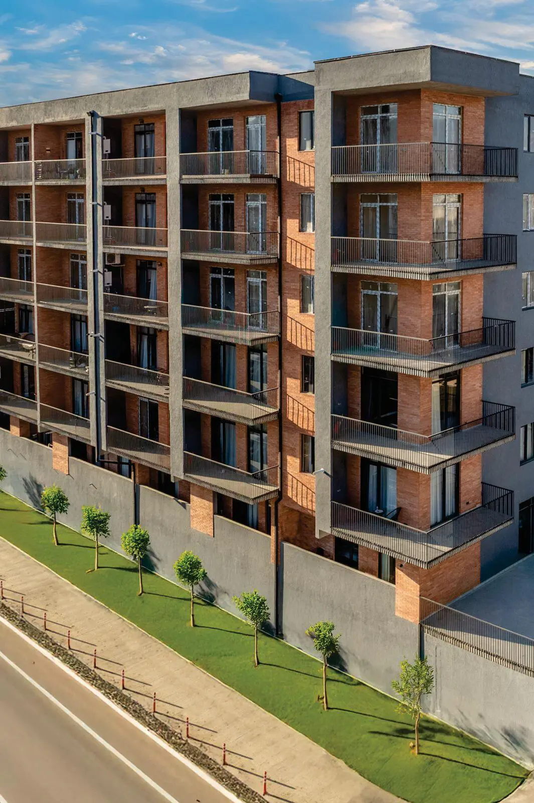 Coloss project exterior surrounded by landscaping